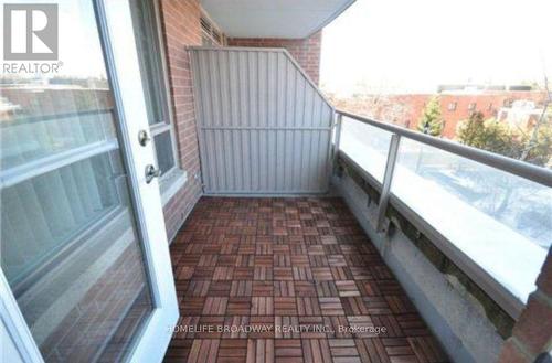 Balcony With Wooden Patio Tiles - 315 - 2 Clairtrell Road, Toronto, ON - Outdoor With Balcony With Exterior