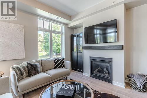217 - 40 Horseshoe Boulevard, Oro-Medonte, ON - Indoor Photo Showing Living Room With Fireplace
