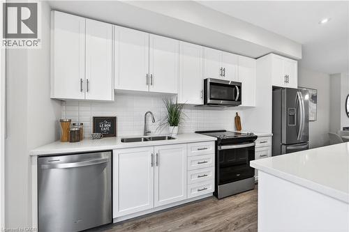 10 Birmingham Drive Unit# 138, Cambridge, ON - Indoor Photo Showing Kitchen With Stainless Steel Kitchen With Double Sink