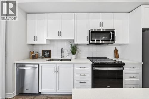 10 Birmingham Drive Unit# 138, Cambridge, ON - Indoor Photo Showing Kitchen With Double Sink
