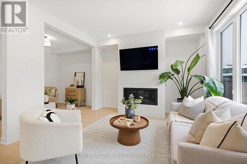 120 Lynn Coulter Street, Ottawa, ON - Indoor Photo Showing Living Room With Fireplace