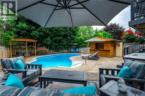 7 Volterra Court, Waterdown, ON - Outdoor With In Ground Pool With Deck Patio Veranda With Exterior