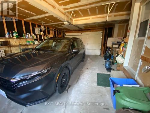 Attached 1.5 Car Garage - 1638 Blakely Drive, Cornwall, ON - Indoor Photo Showing Garage