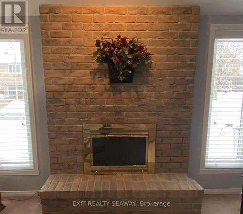 Wood Burning Fireplace - 1638 Blakely Drive, Cornwall, ON - Indoor Photo Showing Other Room With Fireplace