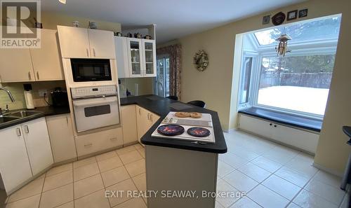 Kitchen with Peninsula Breakfast Bar - 1638 Blakely Drive, Cornwall, ON - Indoor Photo Showing Kitchen