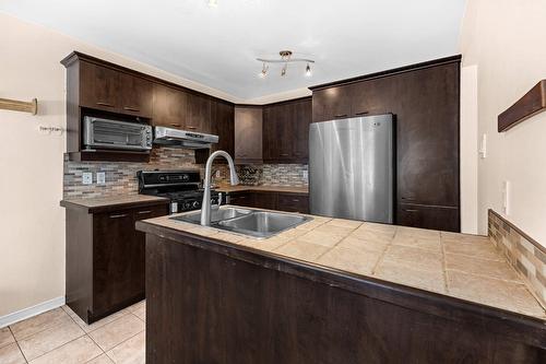 Cuisine - 2070 Rue Des Sarcelles, Vaudreuil-Dorion, QC - Indoor Photo Showing Kitchen With Double Sink
