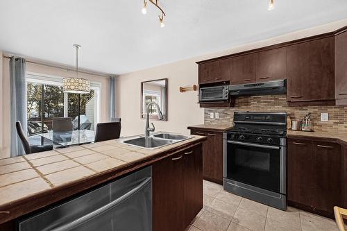 Cuisine - 2070 Rue Des Sarcelles, Vaudreuil-Dorion, QC - Indoor Photo Showing Kitchen With Double Sink