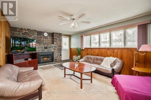Bright family room w gas fireplace - 2 Laird Drive, Parry Sound, ON - Indoor Photo Showing Living Room With Fireplace