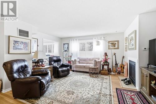 212 - 121 Water Street W, Cornwall, ON - Indoor Photo Showing Living Room With Fireplace