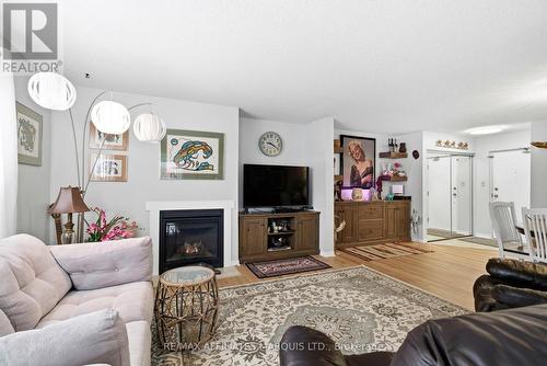 212 - 121 Water Street W, Cornwall, ON - Indoor Photo Showing Living Room With Fireplace