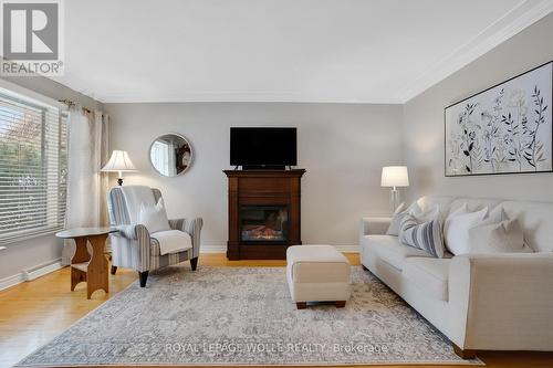 14 Hearth Crescent, Kitchener, ON - Indoor Photo Showing Living Room With Fireplace