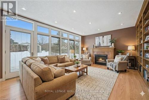 Virtually staged. - 123 Lorraine Avenue, Kitchener, ON - Indoor Photo Showing Living Room With Fireplace