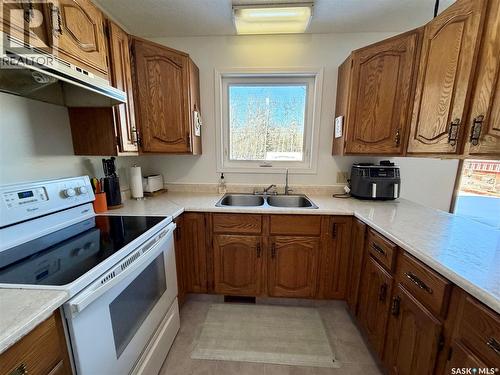 111 Graham Place, Medstead, SK - Indoor Photo Showing Kitchen With Double Sink