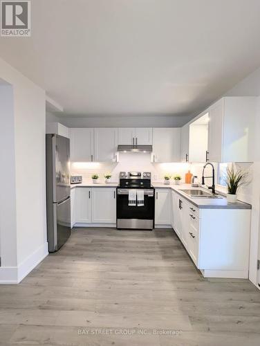 34 Tasker Street, St. Catharines, ON - Indoor Photo Showing Kitchen With Double Sink