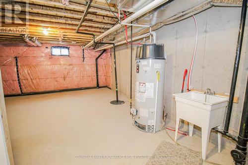 Hot Water Tank & Sump Pump - 77 Keelson Street, Welland (Dain City), ON - Indoor Photo Showing Basement