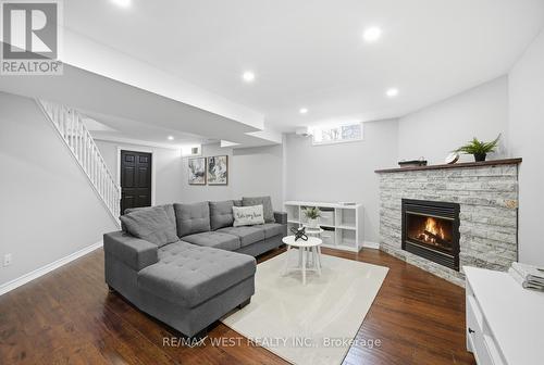 5 Smith Street, New Tecumseth, ON - Indoor Photo Showing Living Room With Fireplace