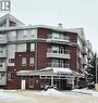 108 110 Armistice Way, Saskatoon, SK  - Outdoor With Balcony With Facade 