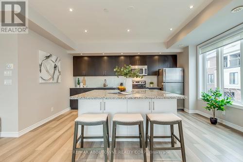 107 - 40 Carnation Avenue, Toronto, ON - Indoor Photo Showing Kitchen With Upgraded Kitchen