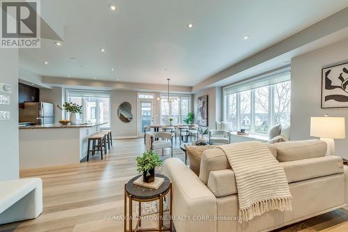 107 - 40 Carnation Avenue, Toronto, ON - Indoor Photo Showing Living Room