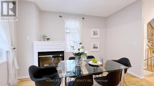 42 - 10 Post Oak Drive, Richmond Hill, ON - Indoor Photo Showing Dining Room With Fireplace