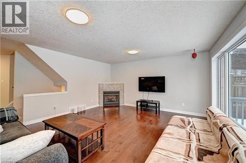 242 Doon Mills Drive, Kitchener, ON - Indoor Photo Showing Living Room With Fireplace