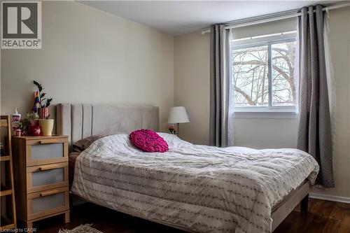 Bedroom featuring dark wood-type flooring - 48 Riverdale Drive Unit# 2, Hamilton, ON - Indoor Photo Showing Bedroom