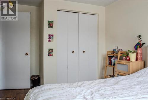 Bedroom featuring a closet and wood finished floors - 48 Riverdale Drive Unit# 2, Hamilton, ON - Indoor Photo Showing Bedroom