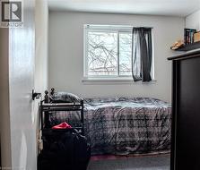 Bedroom with wood finished floors - 