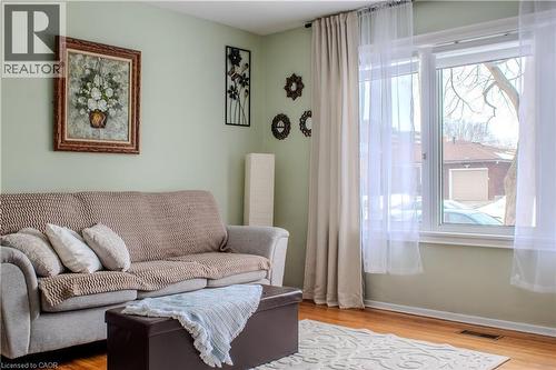 Living area with wood finished floors - 48 Riverdale Drive Unit# 2, Hamilton, ON - Indoor Photo Showing Living Room