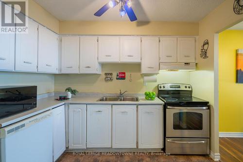 #806 - 2301 Derry Road W, Mississauga, ON - Indoor Photo Showing Kitchen With Double Sink