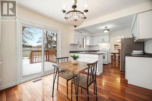 Kitchen has access to backyard deck - 1104 Feeley Court, Mississauga, ON - Indoor Photo Showing Dining Room