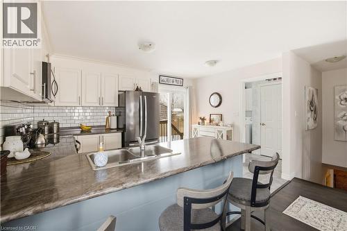 15 Irving Drive, Norwich, ON - Indoor Photo Showing Kitchen With Double Sink