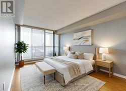 Primary Bedroom with Walk-out to Balcony - 