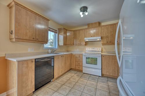 Cuisine - 1428 Rue Jean-Paul-Riopelle, Blainville, QC - Indoor Photo Showing Kitchen