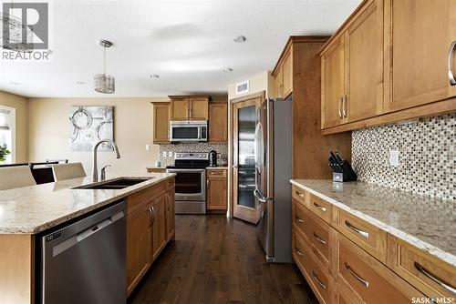 5221 Watson Way, Regina, SK - Indoor Photo Showing Kitchen With Double Sink With Upgraded Kitchen