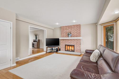 Salon - 1845 Rue Rigaud, Brossard, QC - Indoor Photo Showing Living Room With Fireplace
