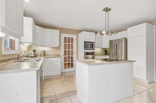 Cuisine - 1845 Rue Rigaud, Brossard, QC - Indoor Photo Showing Kitchen With Double Sink