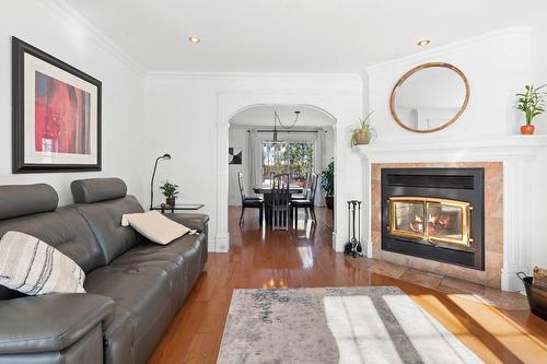 Salon - 9230 Av. Du Patrimoine-Mondial, Québec (Les Rivières), QC - Indoor Photo Showing Living Room With Fireplace