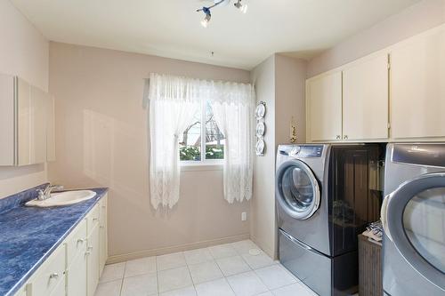 Salle de lavage - 4464 Rue D'Angora, Terrebonne (Terrebonne), QC - Indoor Photo Showing Laundry Room