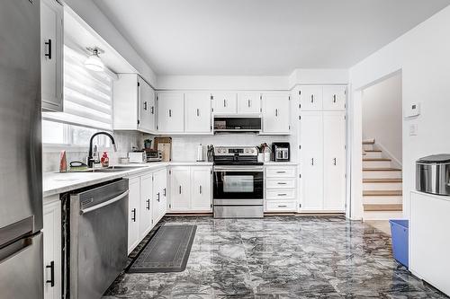 Kitchen - 90 Rue Audubon, Dollard-Des-Ormeaux, QC - Indoor Photo Showing Kitchen