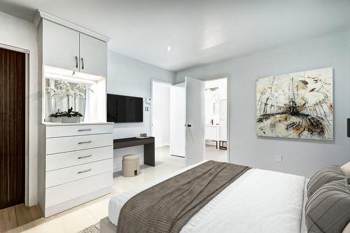 Primary bedroom - 90 Rue Audubon, Dollard-Des-Ormeaux, QC - Indoor Photo Showing Bedroom