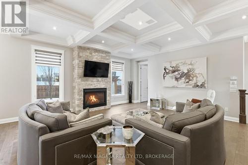 34 Angels Drive, Niagara-On-The-Lake (St. Davids), ON - Indoor Photo Showing Living Room With Fireplace