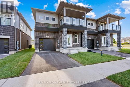 219 Wells Avenue, Fort Erie (Ridgeway), ON - Outdoor With Balcony With Facade