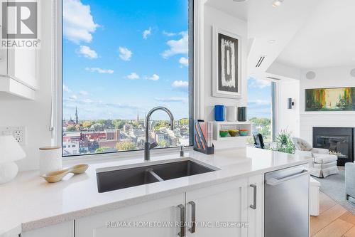1205 - 15 St Andrew Street, Brockville, ON - Indoor Photo Showing Kitchen With Fireplace With Double Sink