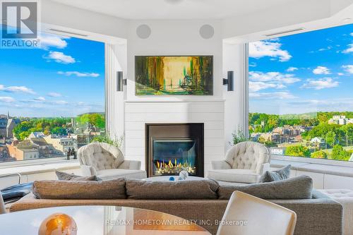 1205 - 15 St Andrew Street, Brockville, ON - Indoor Photo Showing Living Room With Fireplace