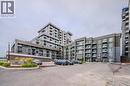 460 Dundas Street Unit# 1212, Waterdown, ON  - Outdoor With Balcony With Facade 