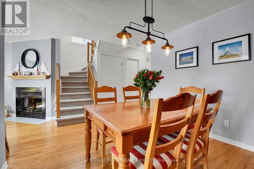 710 Hancock Crescent, Ottawa, ON - Indoor Photo Showing Dining Room With Fireplace