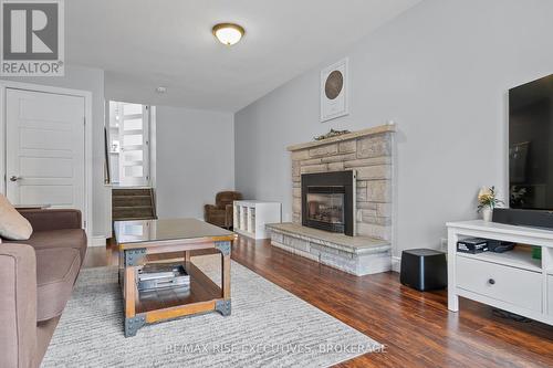 693 Laidlaw Crescent, Kingston (South Of Taylor-Kidd Blvd), ON - Indoor Photo Showing Living Room With Fireplace