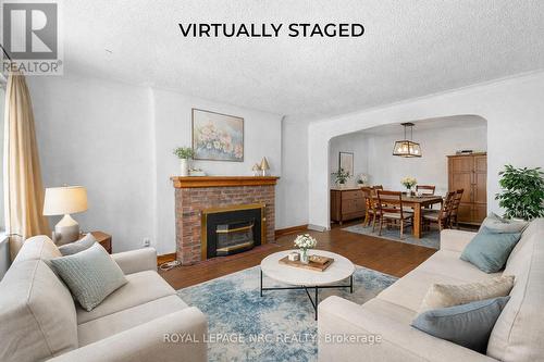32 Ambrose Street, St. Catharines (Ridley), ON - Indoor Photo Showing Living Room With Fireplace
