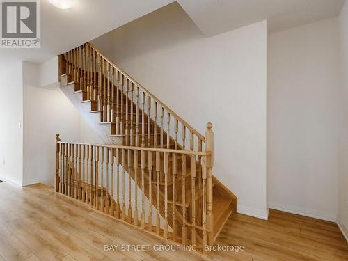 Oak Stairs - 64 Emmas Way, Whitby, ON - Indoor Photo Showing Other Room